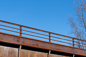 Low angle view of rusty of bridge against clear sky