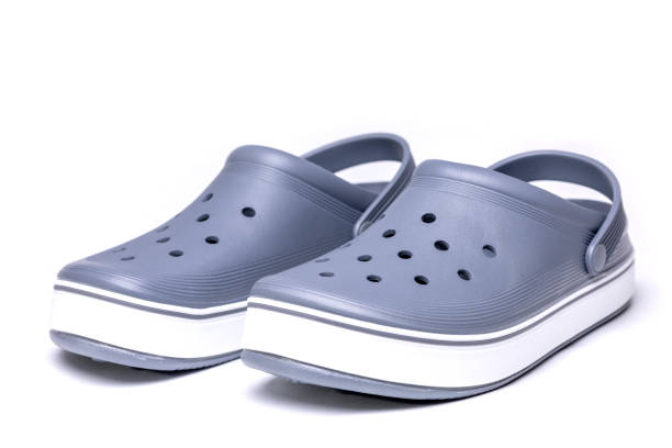 istock Gray crocs on a white background. Rubber shoes 2147507846