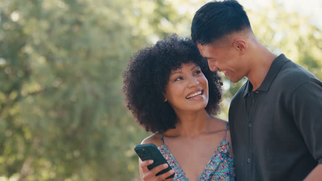 Smiling Couple Or Friends Posing For Selfie On Mobile Phone Outdoors In Countryside