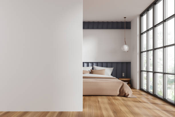 istock Luxury hotel bedroom interior with bed, decoration and window. Mockup wall 2147508841