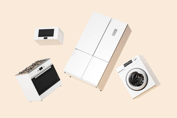 Floating white home appliances on copy space empty beige background