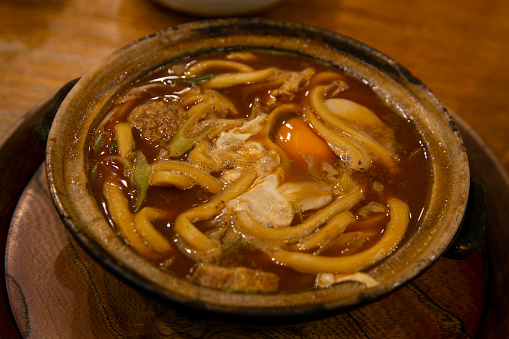 Nagoya famous Miso nikomi udon consists of udon noodles simmered in rich soup made with haccho miso (soybean paste) and bonito stock..