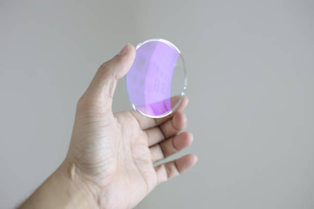 istock Glasses lenses, eyeglasses lenses in hand 2147512006
