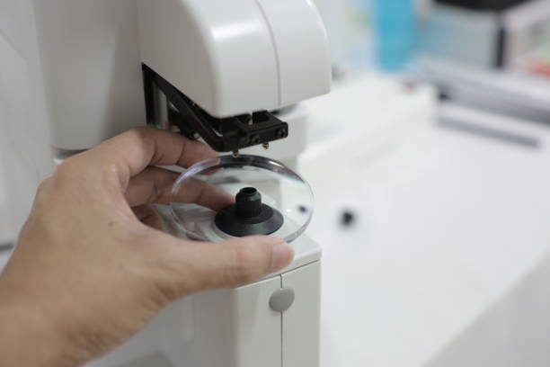 istock Glasses lenses, eyeglasses lenses in hand 2147512038