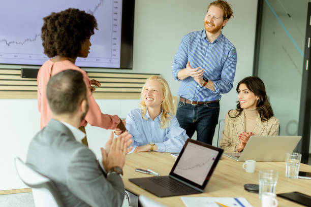 istock Diverse team engaging in collaborative efforts during a creative office meeting at midday 2147512316