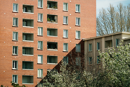 An apartment building with a brick facade