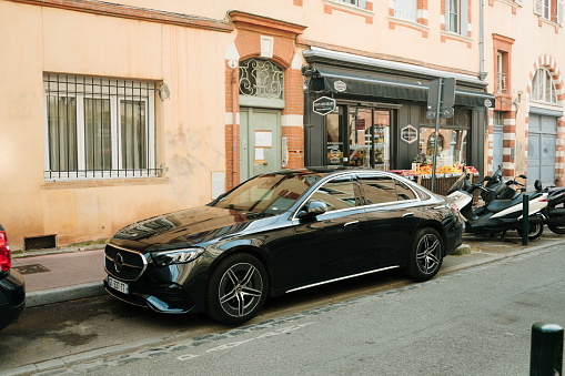 Toulouse, France - 29 March, 2024: A Mercedes-Benz E-Class in a city street