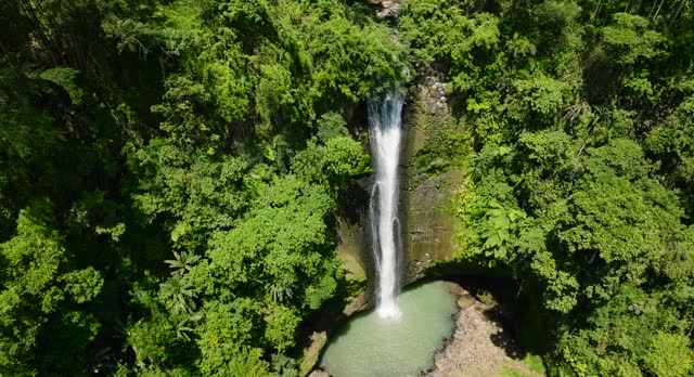 Tropical waterfall in the Philippines. Alalum Falls.