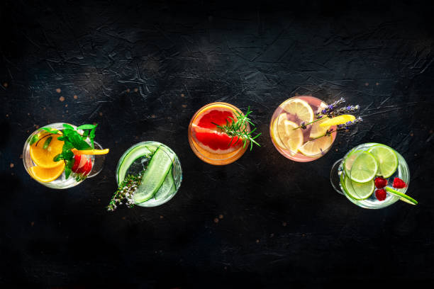 istock Fancy cocktails with fresh fruit. Gin and tonic drinks with ice at a party 2147516106