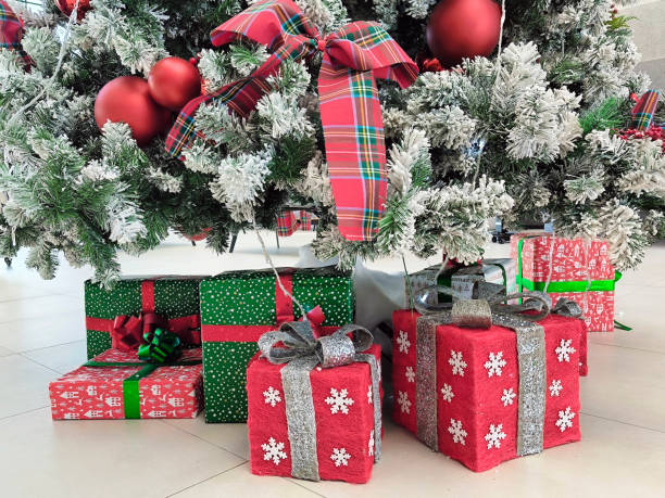 istock Christmas tree decorated with colorful ornaments and lights 2147517098