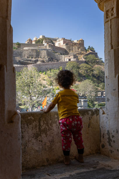 istock young child looking at historic fort at morning from flat angle 2147518064