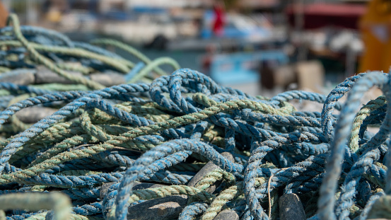 Fishing nets and ropes on the quay of the port of Urla Izmir, Turkey