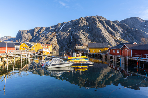 Reflection of typical fishing village at spring, Lofoten Islands