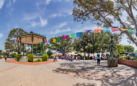 Los Angeles, USA - May 3, 2019: mexican quarter in Los Angeles with historic pavillon near the olvera street, mexican people have festivals at the el Pueblo town square.