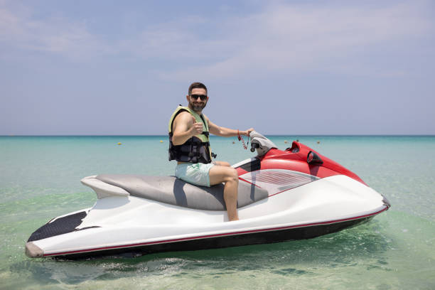 istock Man riding a jet boat 2147519447