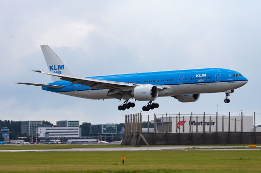 Amsterdam / Netherlands - August 15, 2014: KLM Royal Dutch Airlines Boeing 777-200 PH-BQF passenger plane arrival and landing at Amsterdam Schipol Airport