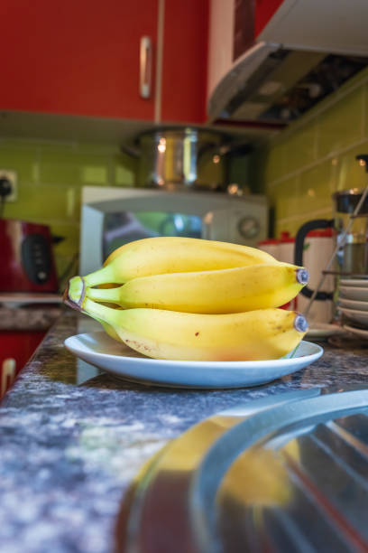 istock Fresh ripe banana fruit on kitchen tabletop 2147523015