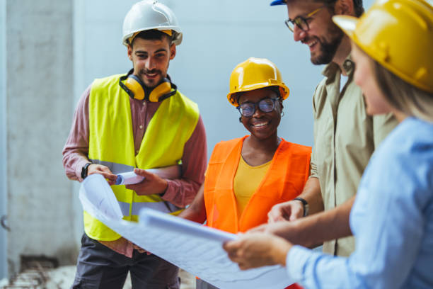 istock Diverse Team of Specialists Taking a Walk Through Construction Site 2147523145