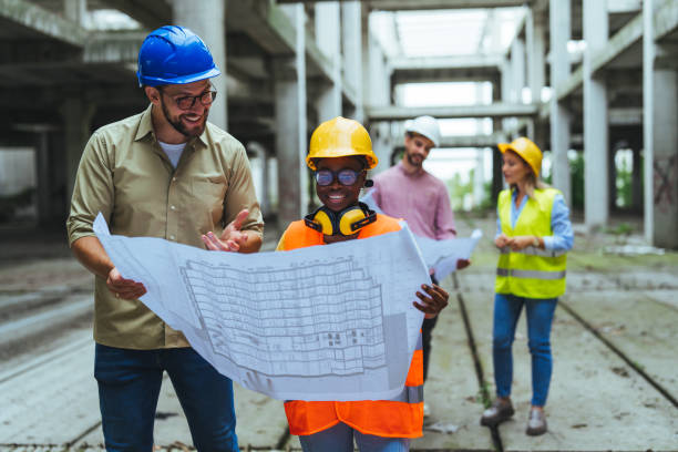 istock Diverse Team of Specialists Taking a Walk Through Construction Site. 2147523824
