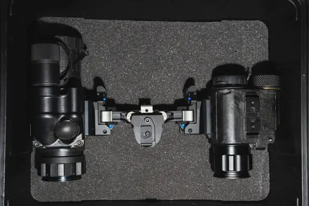 Modern millitary night vision device and thermal vision device in hardcase. Close up photo