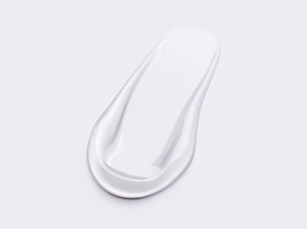 istock cosmetic smears cream gel texture on a light background 2147524094