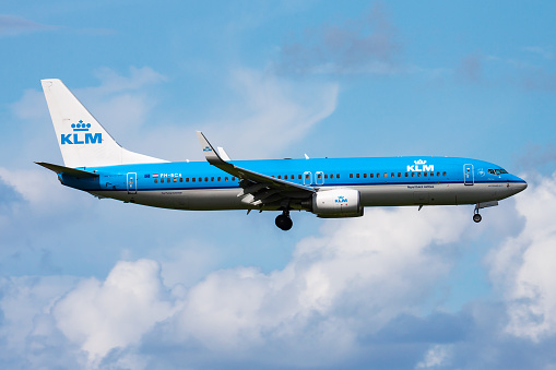 Amsterdam, Netherlands - August 15, 2014: KLM passenger plane at airport. Schedule flight travel. Aviation and aircraft. Air transport. Global international transportation. Fly and flying.