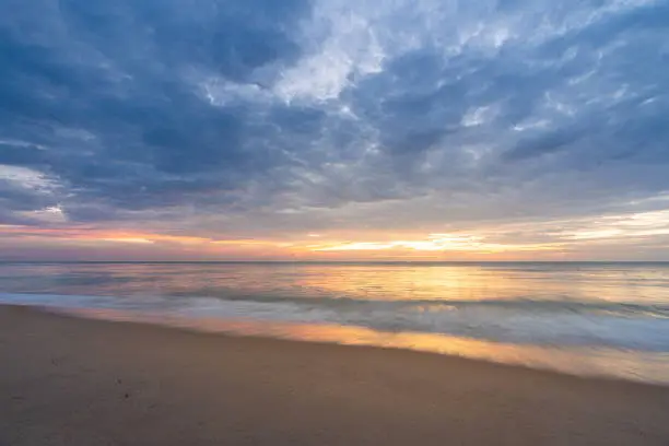 Photo of Beautiful sunset at famous Natai beach in Phang nga, southern part of thailand close to Phuket.