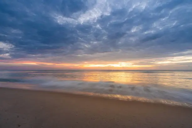 Photo of Beautiful sunset at famous Natai beach in Phang nga, southern part of thailand close to Phuket.