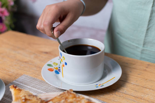 istock Stirring cup of freshly brewed coffee. 2147533130