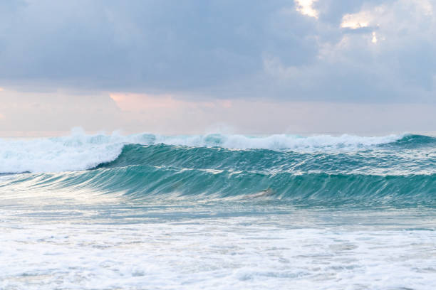 istock Turquoise Ocean Waves Crashing Under Cloudy Sky. Bali, Dreamland beach. 2147536883