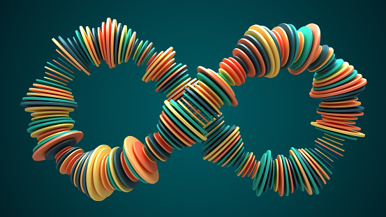 Abstract infinity symbol with multicolor circles.  3d render isolated on the green background