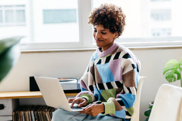 istock Colleague working in bright freelance co-working space 2147541479