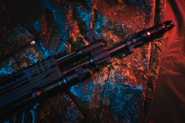 Firearm tactical weapon, barrel and fore-end with tactical flashlight, AK12 rifle. Close up photo