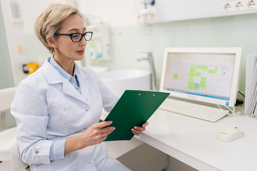 Female ophthalmologist in her own modern clinic