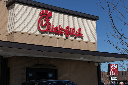 Chicago - April 6, 2024: Chick-fil-A chicken restaurant. Despite ongoing controversy, Chick-fil-A is wildly popular.