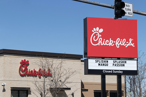 Chicago - April 6, 2024: Chick-fil-A chicken restaurant. Despite ongoing controversy, Chick-fil-A is wildly popular.