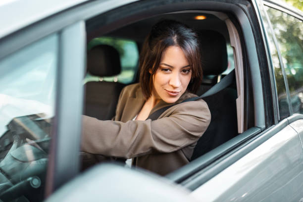 istock Woman Behind the Wheel on Her Way to Work 2147544801