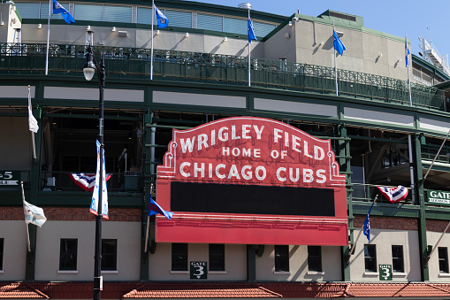 Chicago - April 6, 2024: Wrigley Field Home of Chicago Cubs in red with copy space. Wrigley Field has been home to the Cubs since 1916.