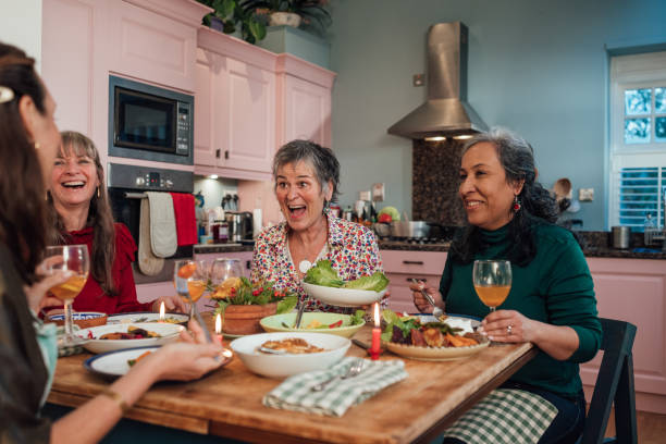 istock Friends Enjoying a Meal at Home 2147546737