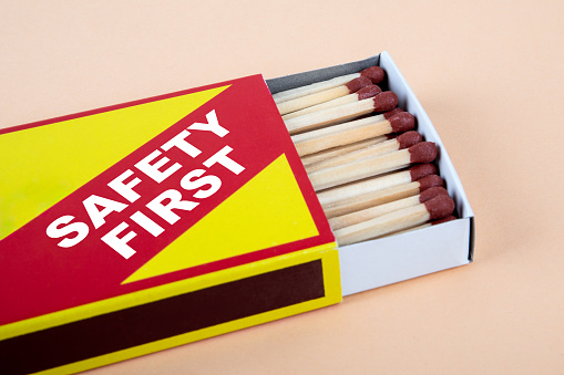 Safety First Concept. Box of matches on a light background.