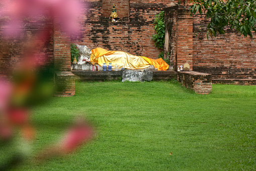 Ancient Wat Yai Chai Mongkol temple. Ayutthaya Historical Park, Thailand. UNESCO World Heritage Site. The Historic City of Ayutthaya, founded in 1350,The ruins of the old city now form the Ayutthaya Historical Park, an archaeological site that contains palaces, Buddhist temples, monasteries and statues
