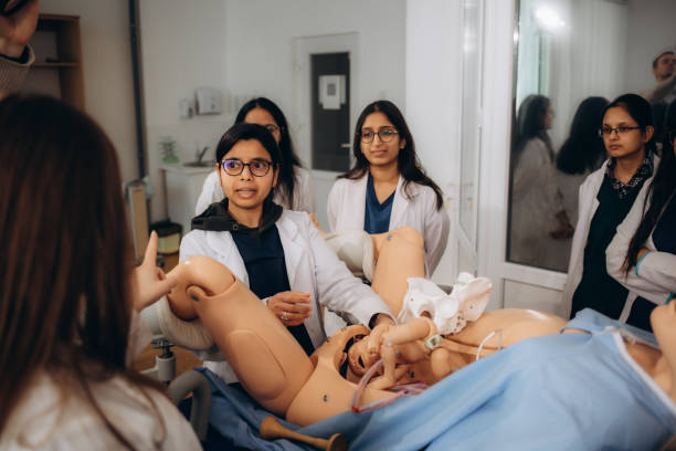istock practical training of gynecology students on training obstetrics on a mannequin. 2147562967