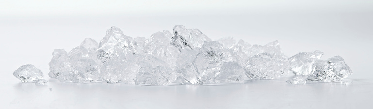 small amount of crushed ice on white background