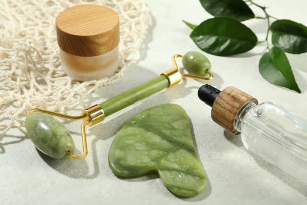 istock Face care concept with gua sha, face roller and cosmetic 2147568610