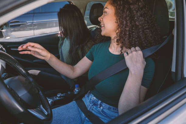 istock Two Female Friends Going On A Trip, Sharing A Ride 2147570460