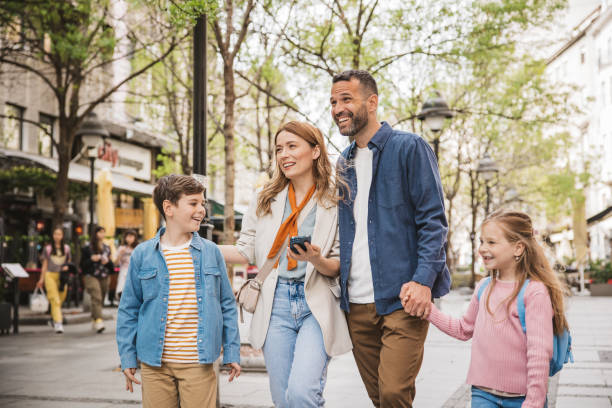 istock Family exploring city 2147574884