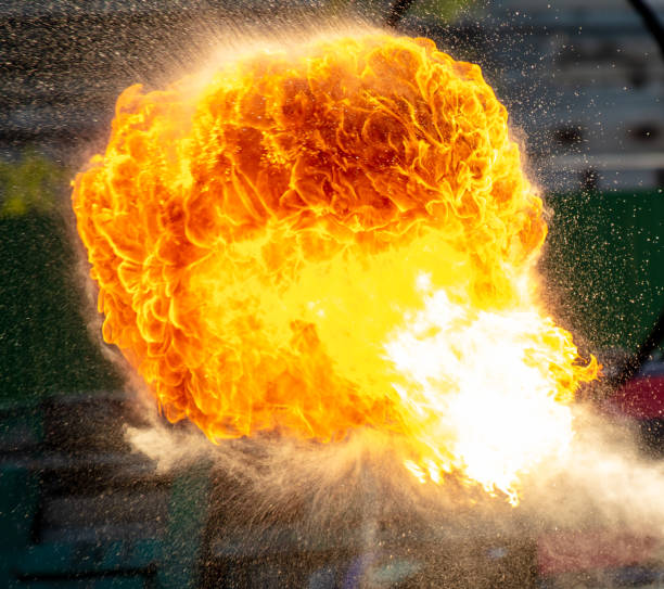 A flame of fire from a man's mouth.