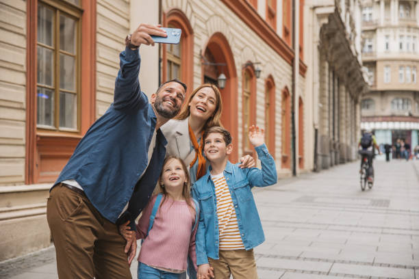 istock Family exploring city 2147575063