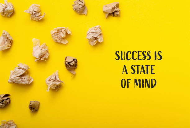 istock A yellow background with a bunch of crumpled paper on it 2147576346