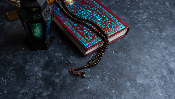 istock Quran with tasbih and lantern 2147576446